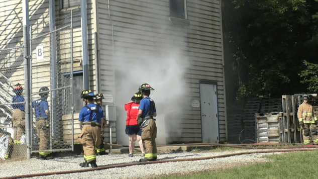 Smoke billows out of the Hocking College Fire Training Center. [Haley Swaino | WOUB]
